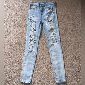 Light wash ripped skinny jeans